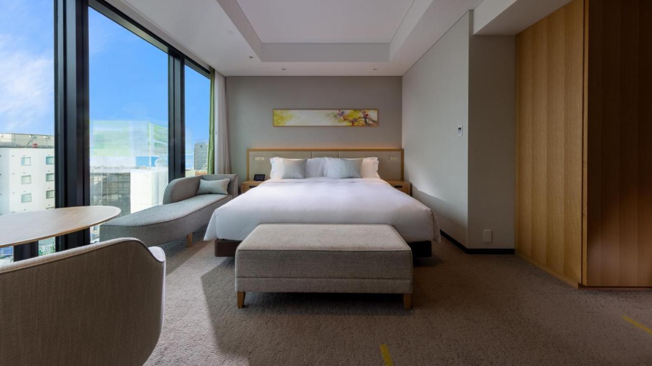 Miyako Hotel Hakata Fukuoka  Ngoại thất bức ảnh A bedroom at the hotel